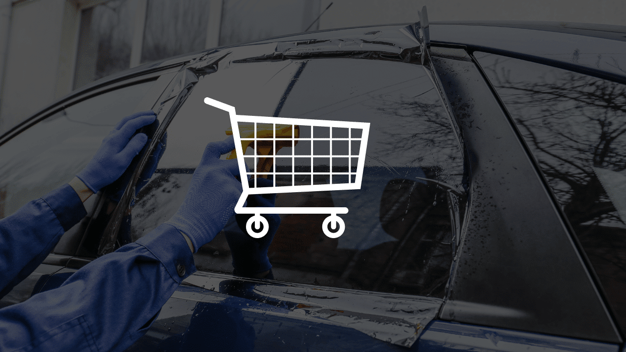 A professional automotive window tinting installation featuring the ultimate guide to window film distributors for professional tint shops.